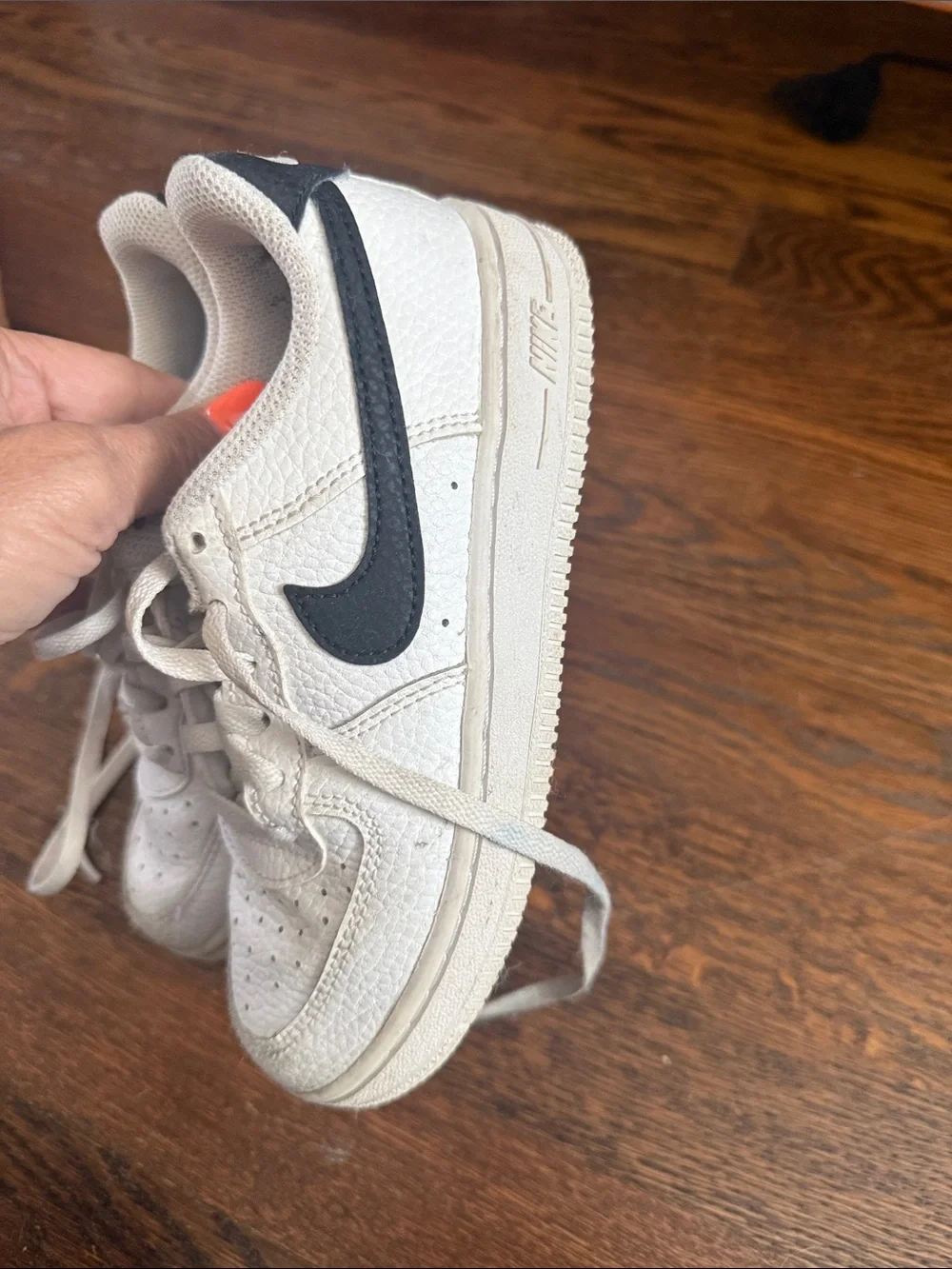 Nike White Sneakers with Black Swoosh